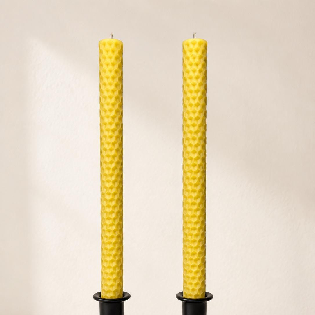 Natural golden honeycomb beeswax taper candles.